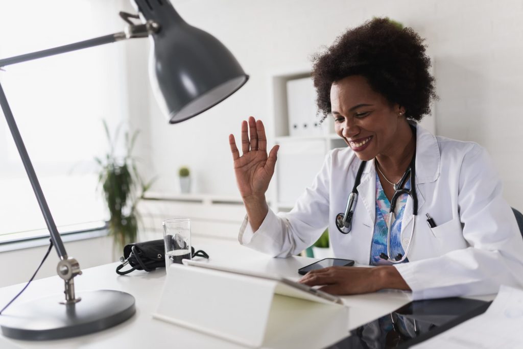 nurse on computer, virtual visit