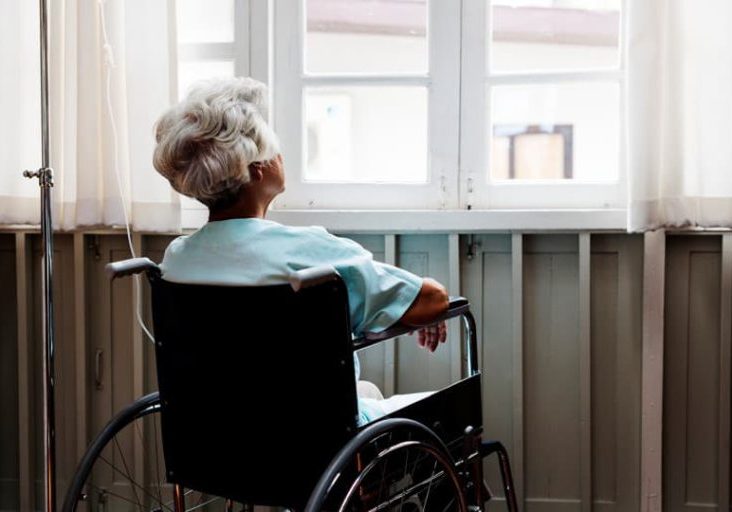 elderly woman in wheelchair